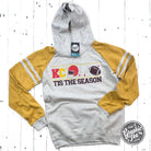 KC Tis the Season varsity hoodie featuring festive graphic design, casual fit, and branded by The Graphic Tee.