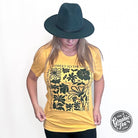 Heather golden yellow short sleeve graphic tee from The Graphic Tee with the "Kind Words" design on the front.