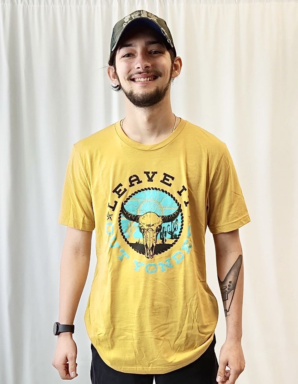 Yellow graphic short sleeve tee from The Graphic Tee with "Leave It Out Yonder" design on front, casual and stylish.