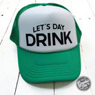 Let's Day Drink foam trucker cap in Kelly green and white by The Graphic Tee, featuring a classic trucker hat style.