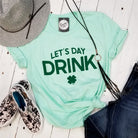 Let's Day Drink unisex graphic T-shirt by The Graphic Tee, featuring a casual short-sleeve design with a fun daytime drink print.
