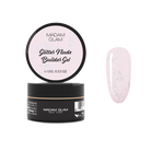 Glitter Nude Pink nail polish by Madam Glam showing a shimmering nude pink color with glitter accents.