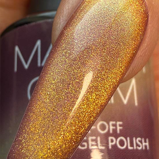 Madam Glam Golden Leaves nail polish with shimmering gold leaf design and smooth glossy finish.
