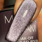 Dark purple velvet nail polish from Madam Glam's Haunted Velvet collection, showcased in a sleek bottle with a glossy finish.