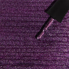 Madam Glam Hocus Plum gel nail polish bottle with a deep purple color and glossy finish.