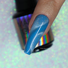 Holographic cat eye gel polish by Madam Glam showing a shimmering, iridescent finish with a sleek cat eye effect.