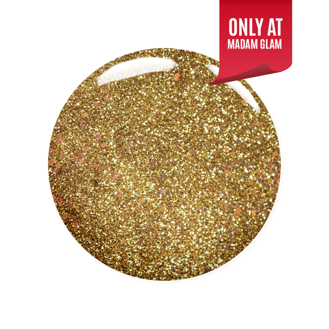 Madam Glam Santa's Treasure nail polish bottle with festive red and gold design on a white background.