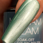 Madam Glam Serene Sky nail polish bottle with a sleek design and light blue color, displayed on a neutral background.