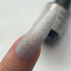 Madam Glam Shine & Thrive nail polish bottle with a sleek black cap and clear label display.
