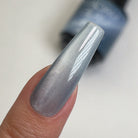 Madam Glam Sleepy Morning gel nail polish bottle with pastel pink and purple gradient label, showcasing a soft, calming design.