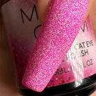 Sparkly Hearts by Madam Glam, a close-up of glittery heart-shaped nail art design with shimmering silver and pink accents.