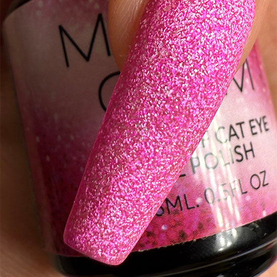 Sparkly Hearts by Madam Glam, a close-up of glittery heart-shaped nail art design with shimmering silver and pink accents.