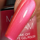 Madam Glam Sweet Candy nail polish bottle featuring vibrant pink and yellow colors with a glossy finish.