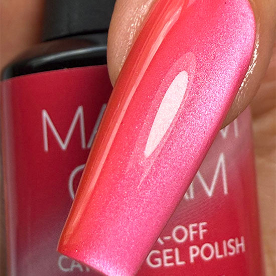 Madam Glam Sweet Candy nail polish bottle with colorful label, showcasing vibrant pink and yellow packaging.