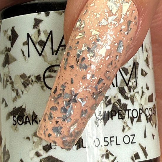 Madam Glam Touches of Silver nail polish bottle with silver shimmer finish and sleek black cap.