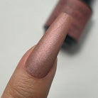 Open Treasure Book by Madam Glam featuring colorful nail art designs on glossy pages.
