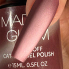 Madam Glam Wine & Berries nail polish with deep red and berry shades in a sleek bottle, perfect for elegant manicures.