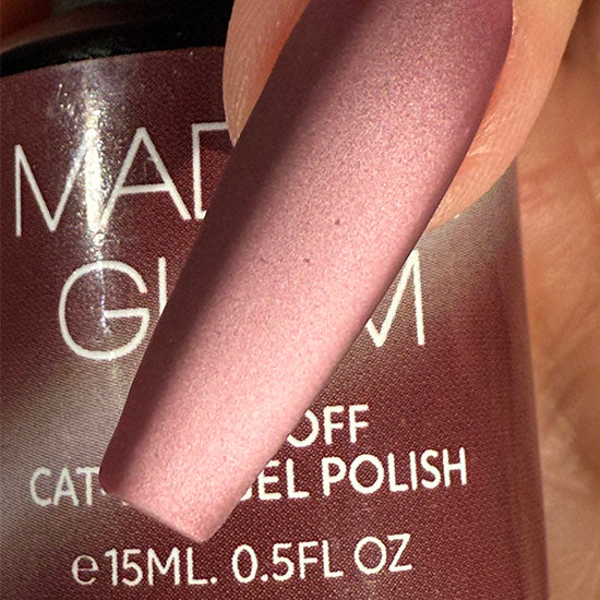 Madam Glam Wine & Berries nail polish with deep red and berry shades in a sleek bottle, perfect for elegant manicures.