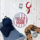Made in the USA ladies muscle tank crop top by The Graphic Tee, featuring a stylish graphic design on a sleeveless crop top.