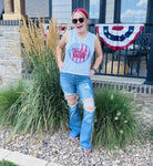 Made in the USA ladies muscle tank crop top with graphic design, from The Graphic Tee, shown on a model.