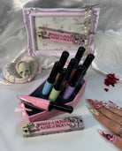 Makeup A Murder, INC Cause of Death Pastel Collection featuring pastel makeup shades in sleek packaging.