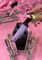 Makeup A Murder, INC Cause of Death Pastel Collection eyeshadow palette with soft pastel shades and artistic packaging.