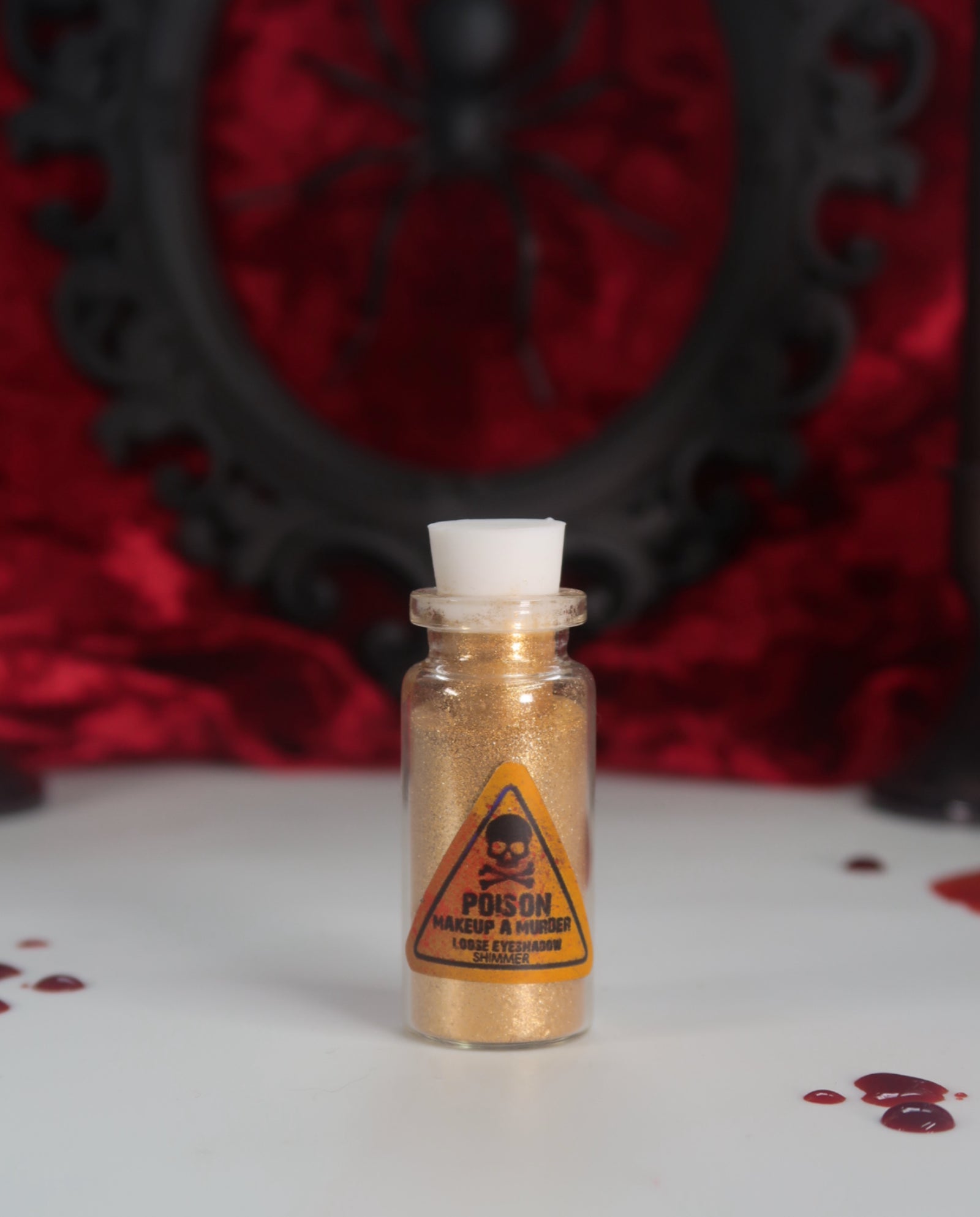 Makeup A Murder, INC Holiday Poison Pigment Collection with vibrant colorful pigments in various shades and packaging.