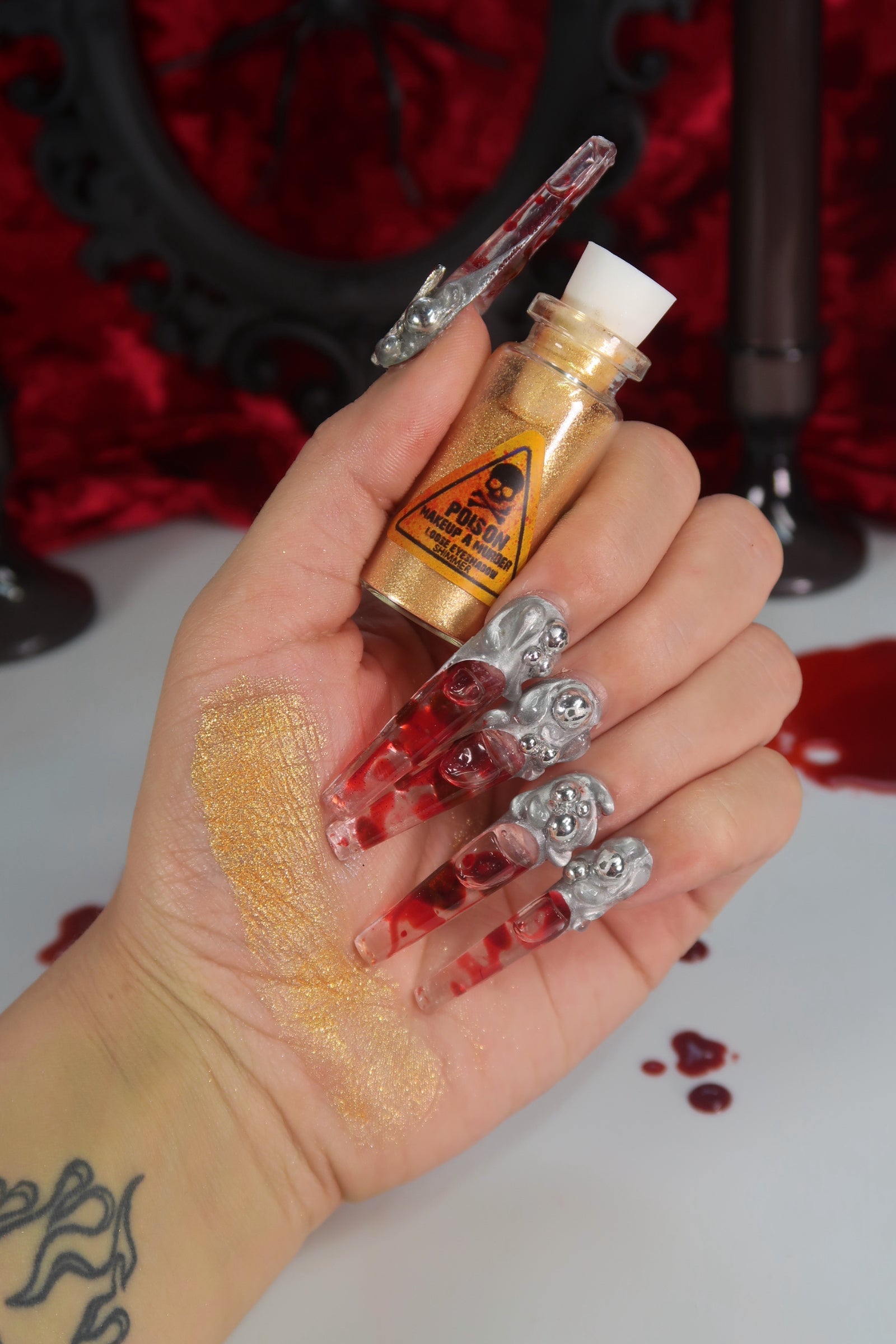 Holiday Poison Pigment Collection by Makeup A Murder, INC featuring vibrant, colorful eyeshadow pigments in festive shades.