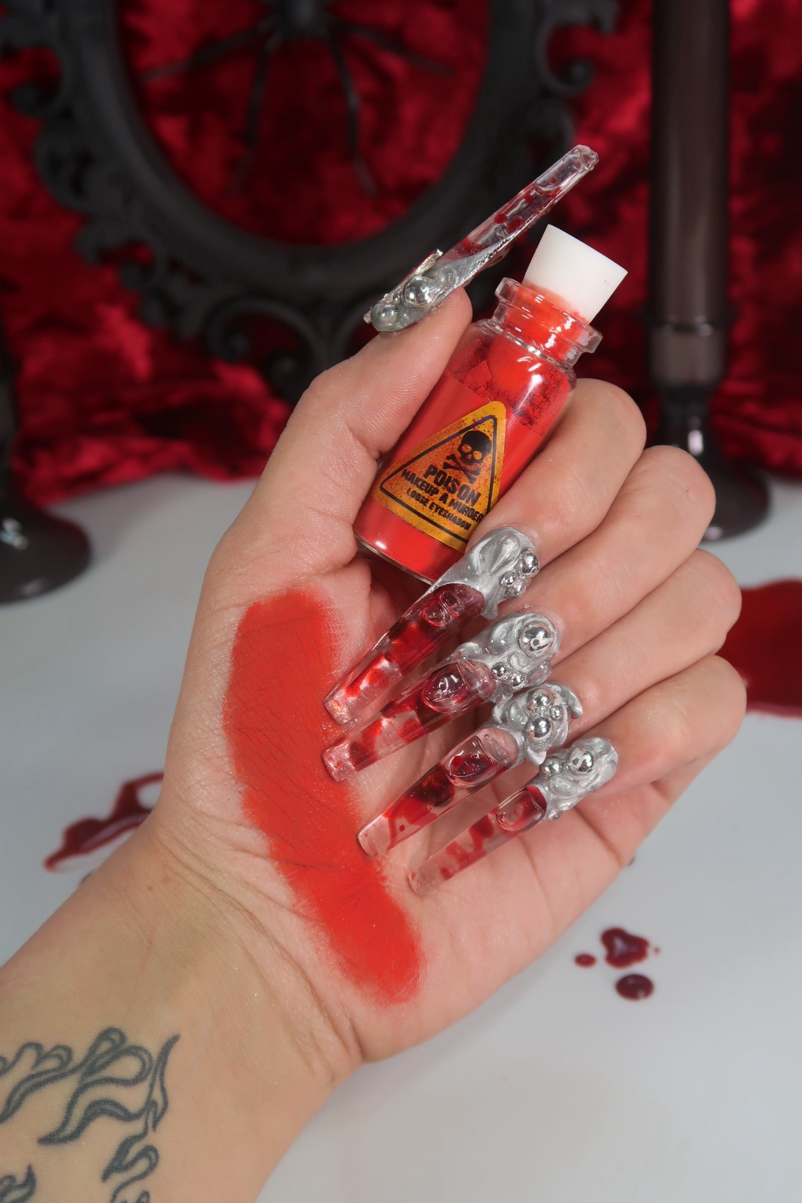 Makeup A Murder, INC Holiday Poison Pigment Collection with vibrant colorful makeup pigments in festive packaging