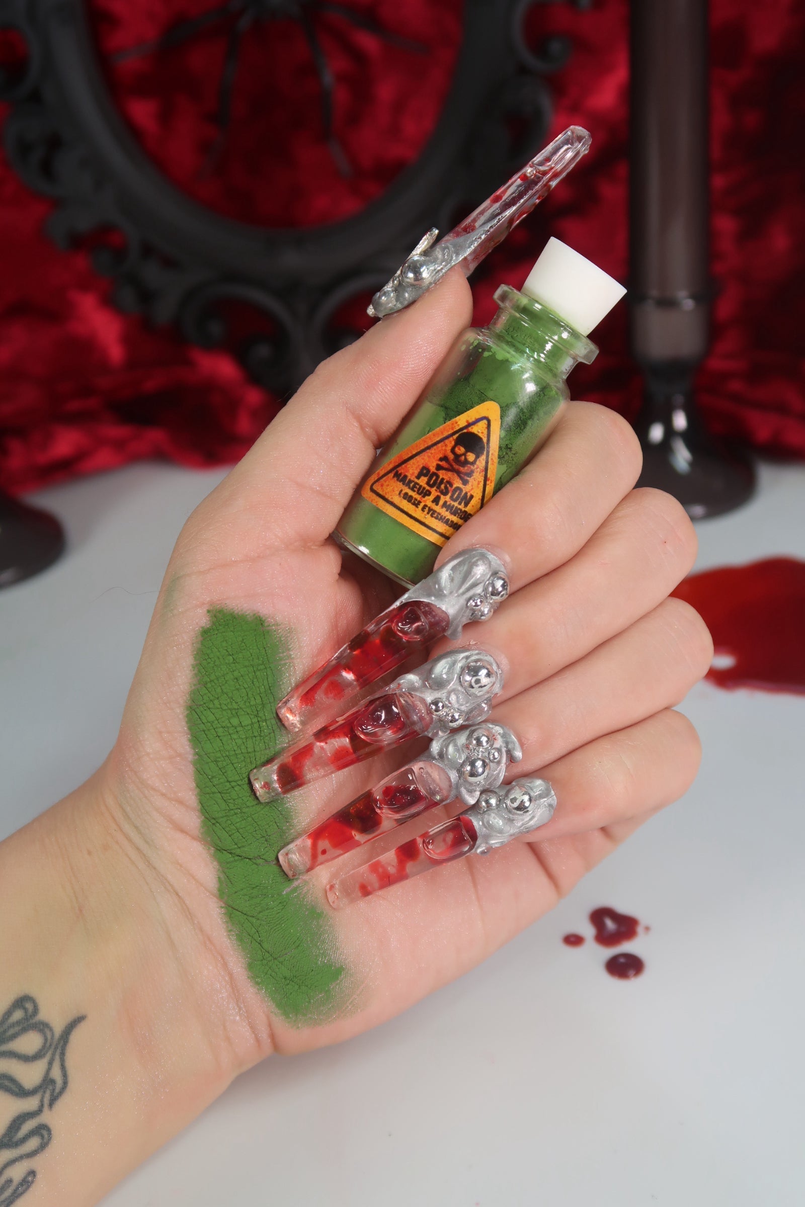 Makeup A Murder, INC Holiday Poison Pigment Collection with vibrant eyeshadow pigments in festive colors.