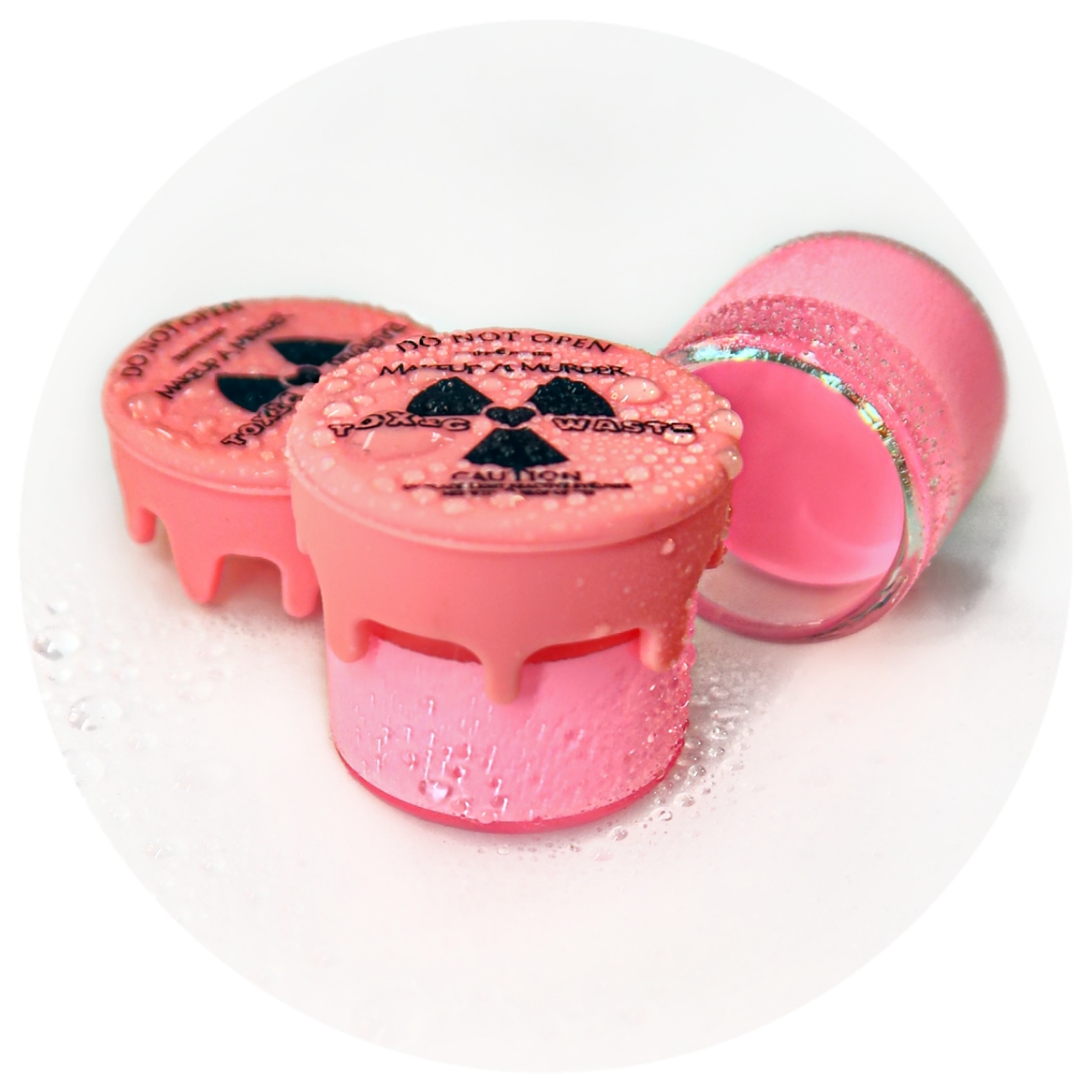 Toxic Waste Neon Eyeliner Collection by Makeup A Murder, INC featuring vibrant, colorful eyeliner pencils on a display background.