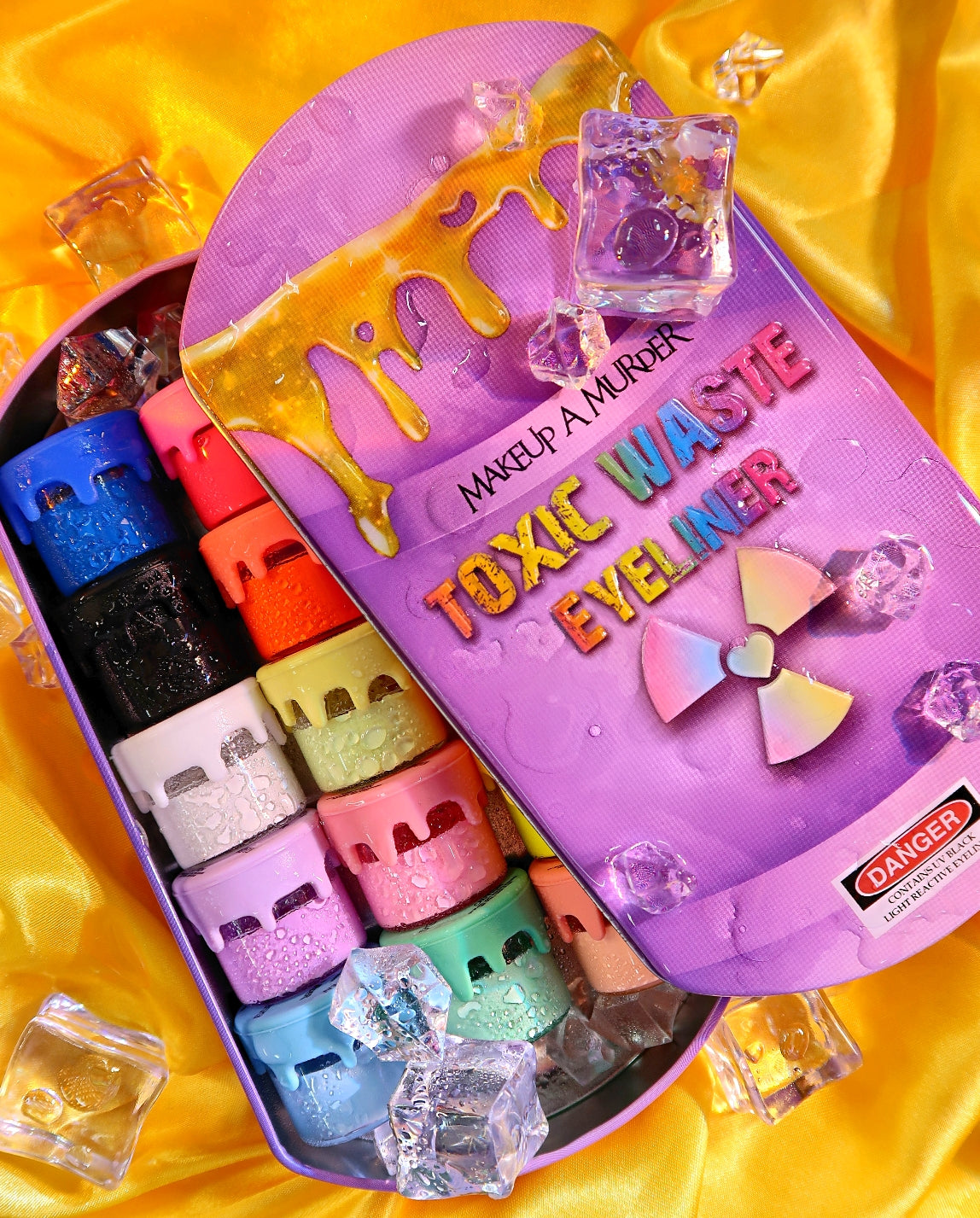 Makeup A Murder, INC Toxic Waste Neon Eyeliner Collection featuring vibrant, colorful eyeliner pencils with bold neon shades.