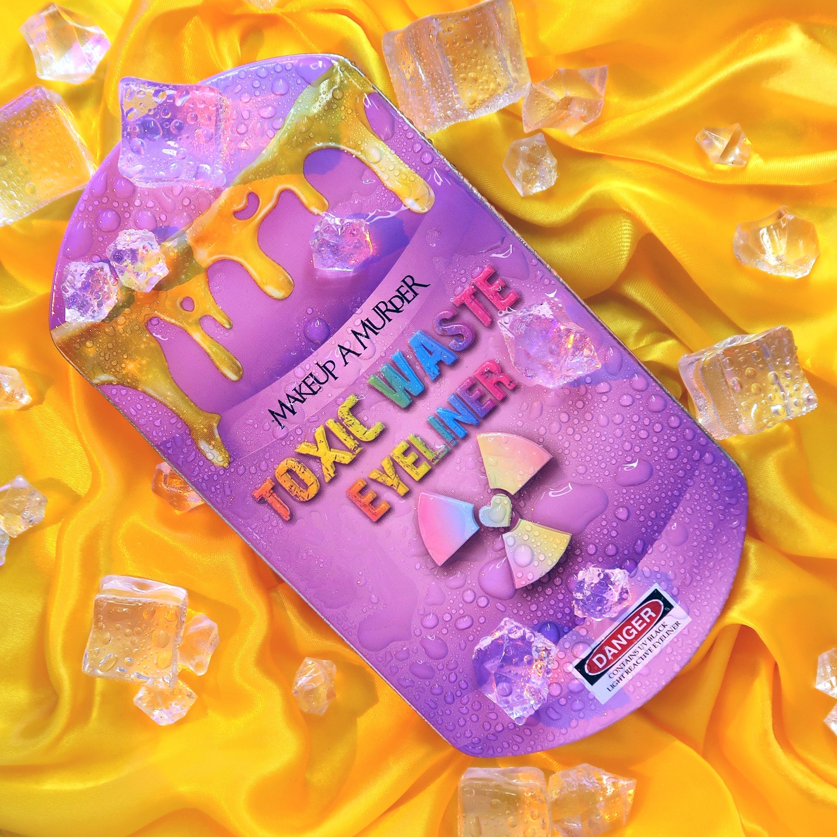 Toxic Waste Neon Eyeliner Collection by Makeup A Murder, INC featuring vibrant, colorful eyeliners in bold packaging.