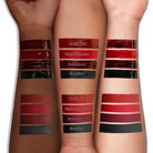 Makeup A Murder, INC KISS of DEATH Bloody Lip Stains lipgloss with deep red, bloody effect and sleek tube packaging.