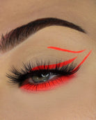 Neon pigments from Makeup A Murder, INC mixed with Chemical X Cosmetic Mixing Sealant, vibrant and glowing for creative makeup looks.