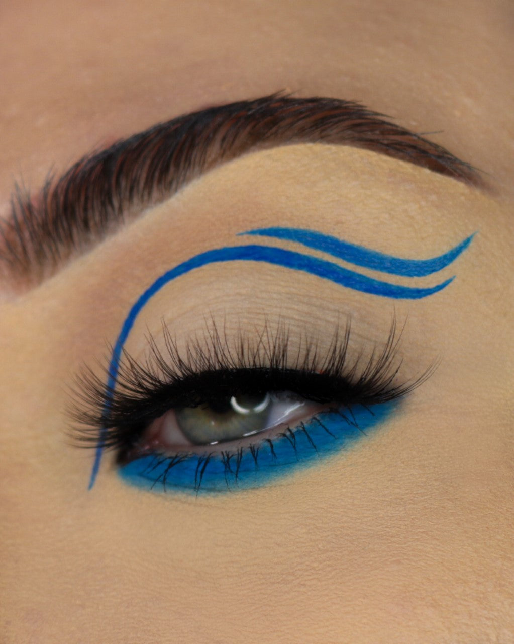 Neon pigments from Makeup A Murder, INC, shown with Chemical X cosmetic mixing sealant in a clear container.