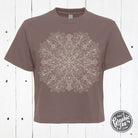 Mandala design women's waist-length short sleeve tee by The Graphic Tee, showing vibrant print on lightweight shirt.
