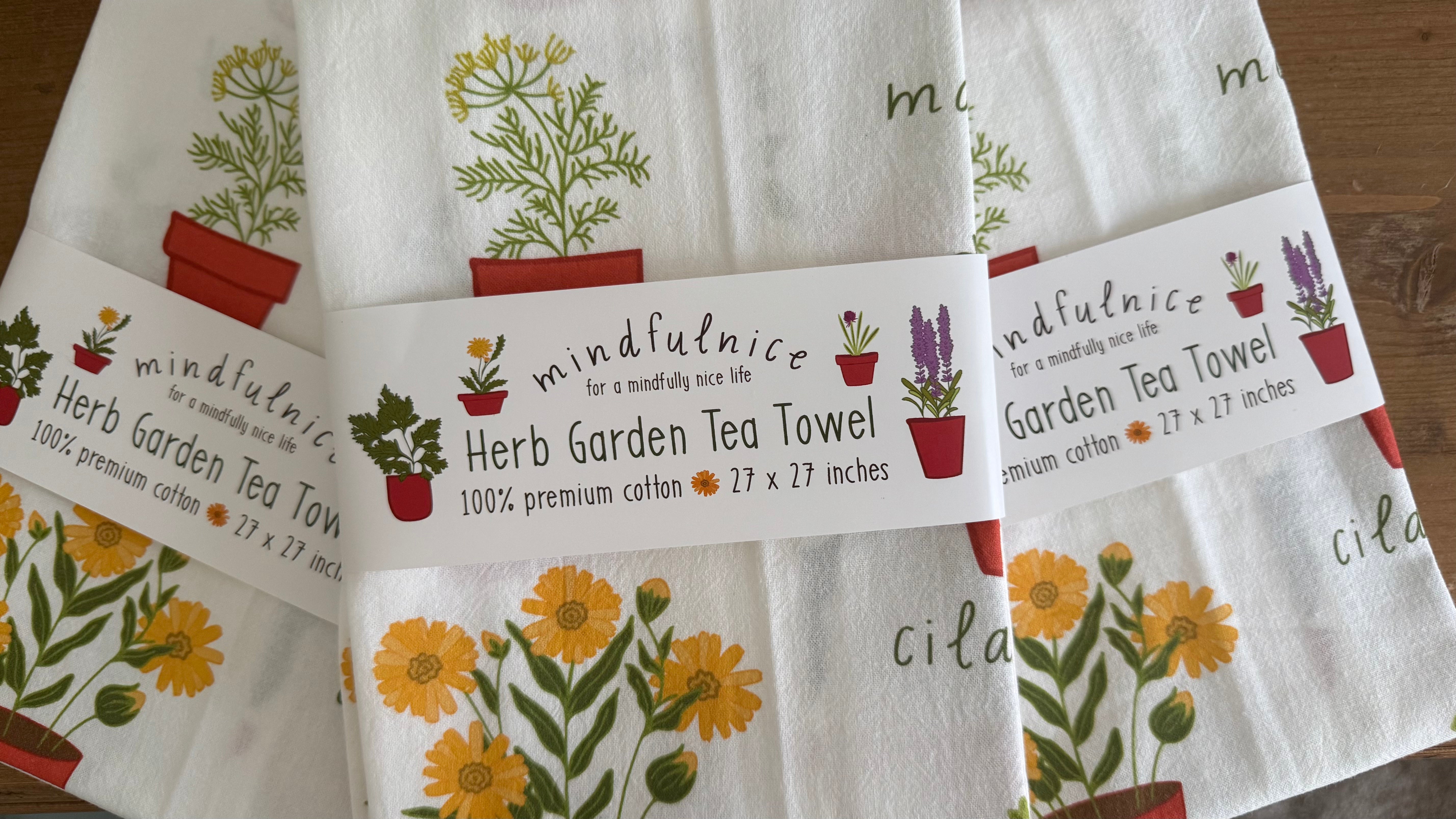 Herb Garden Tea Towel from Mindfulnice featuring a botanical herb design, perfect for kitchen gift or home decor.