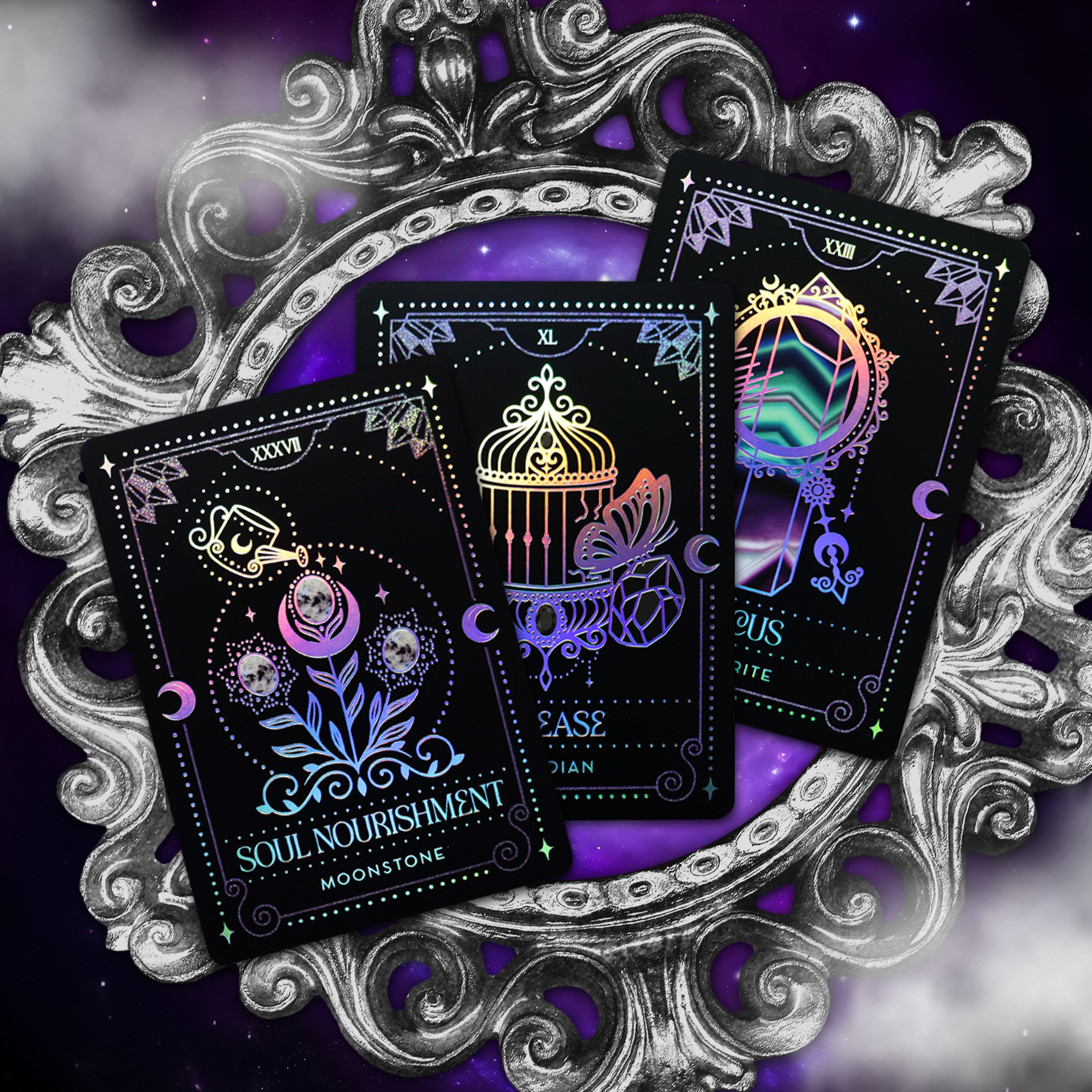 Crystal Portal Oracle Card Deck by Moonstruck Crystals, featuring colorful mystical cards spread out on a wooden surface.