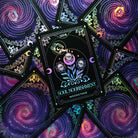 Crystal Portal Oracle Card Deck by Moonstruck Crystals, featuring colorful cards with mystical designs laid out on a wooden surface.
