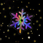 Holo crystal snowflake sticker from Moonstruck Crystals featuring iridescent holographic snowflake design on a clear background.