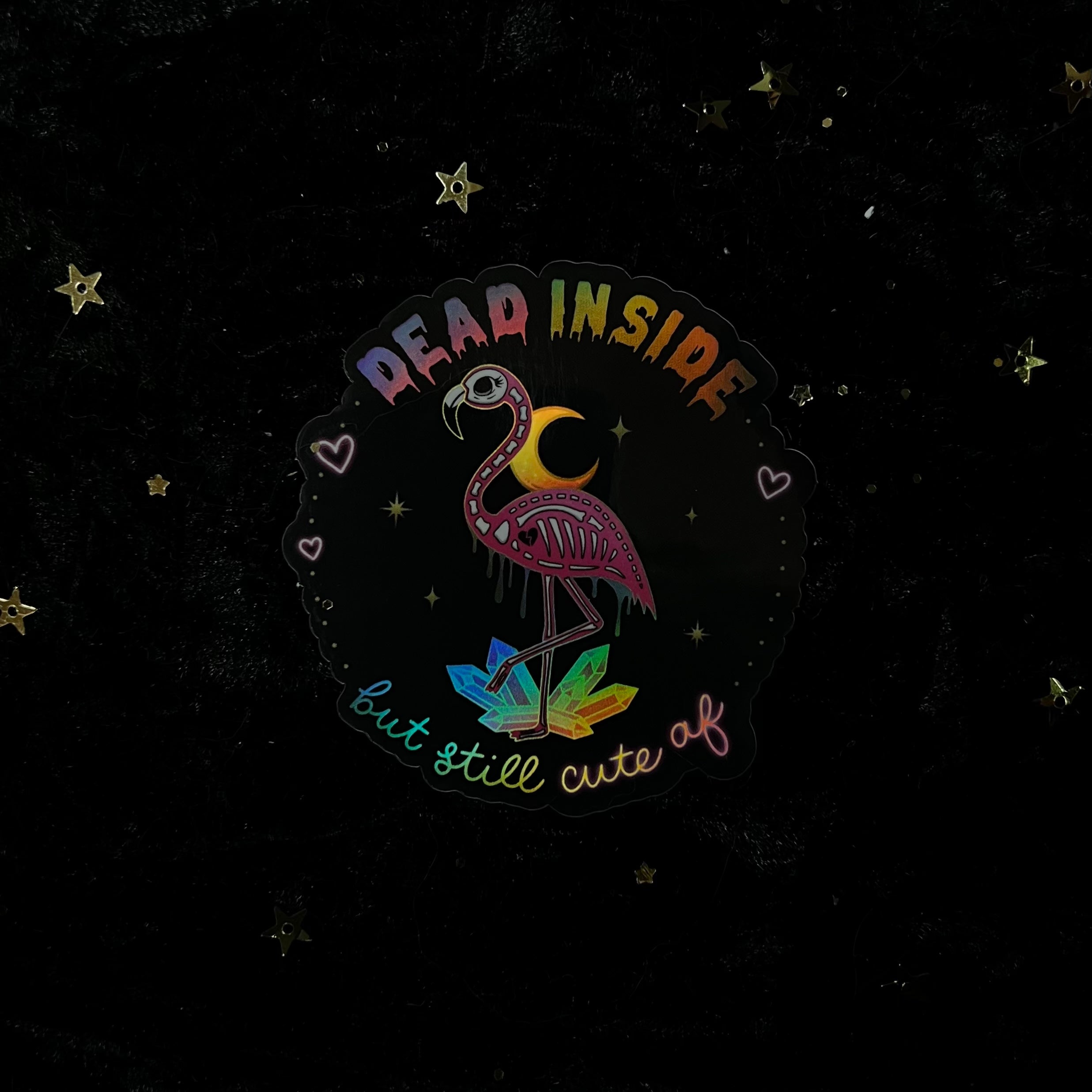 Holo flamingo sticker with "Dead Inside But Still Cute AF" design by Moonstruck Crystals, vibrant and shiny 3D holographic effect.