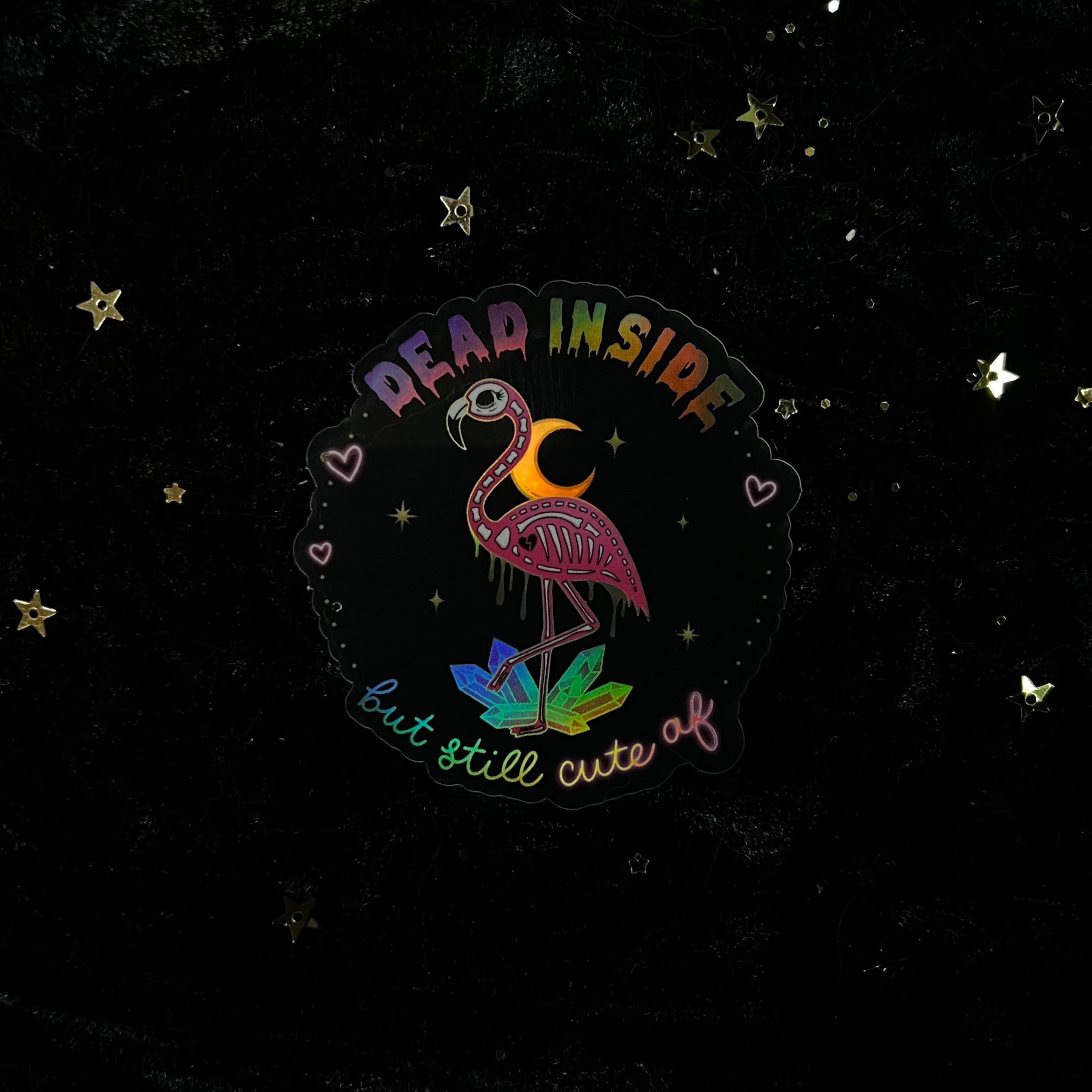 Dead Inside But Still Cute AF flamingo holo sticker by Moonstruck Crystals, featuring vibrant holographic flamingo design.