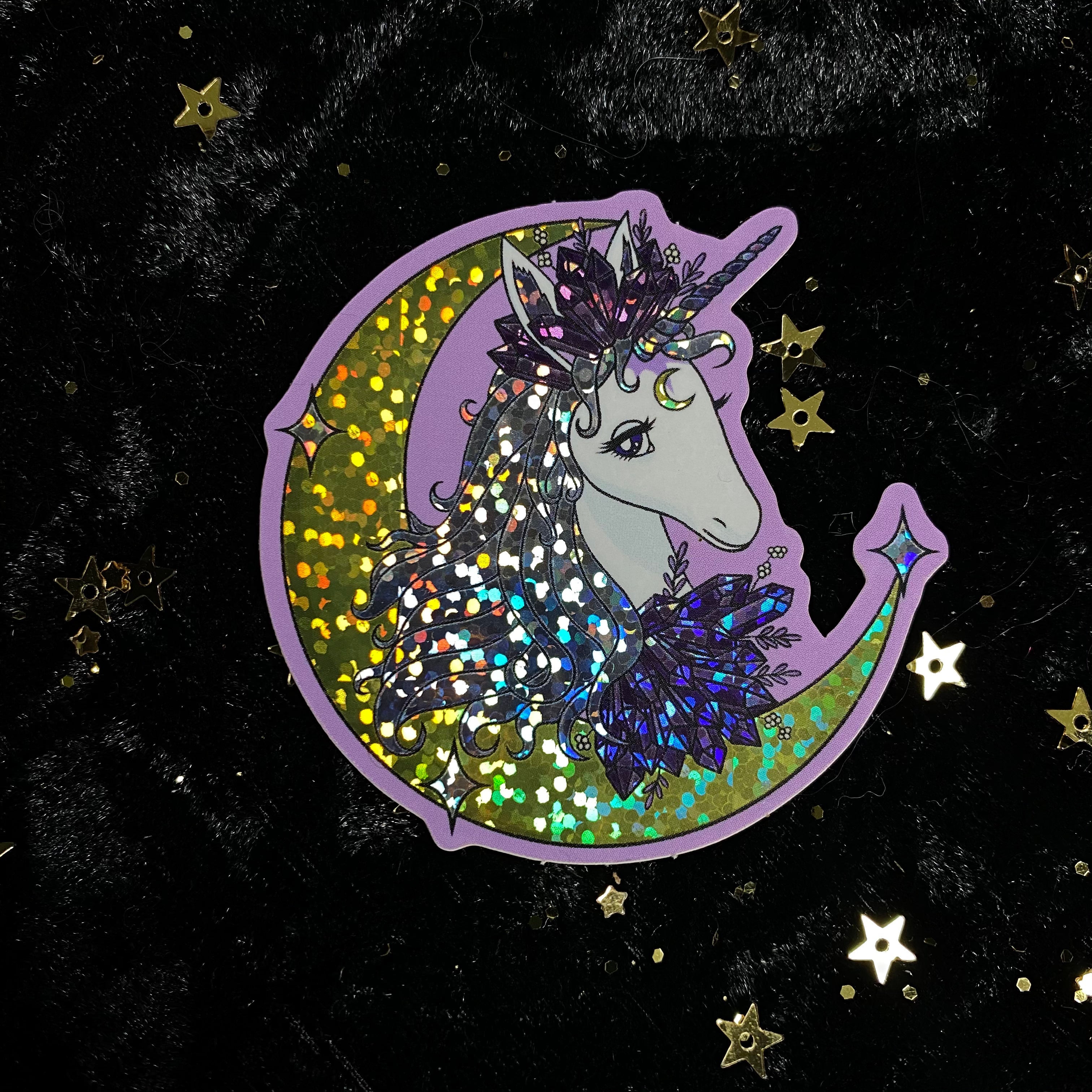 Colorful glitter crystal unicorn sticker from Moonstruck Crystals featuring a whimsical, sparkly unicorn design.