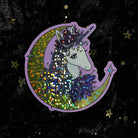 Glitter crystal unicorn sticker by Moonstruck Crystals featuring a shiny, colorful unicorn design with sparkling accents.