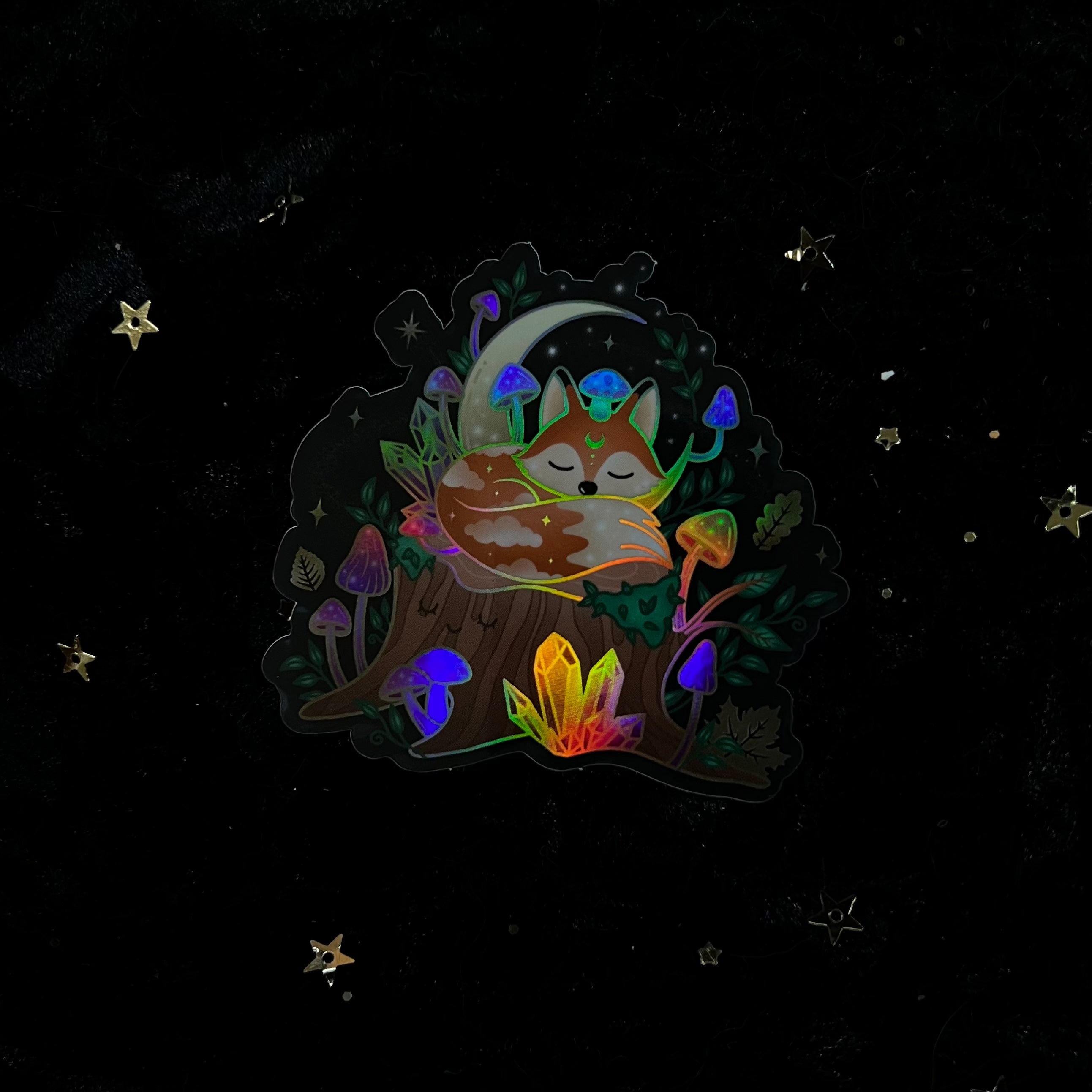 Holo Mushroom Crystal Fox sticker by Moonstruck Crystals featuring a colorful, holographic fox and mushroom design.