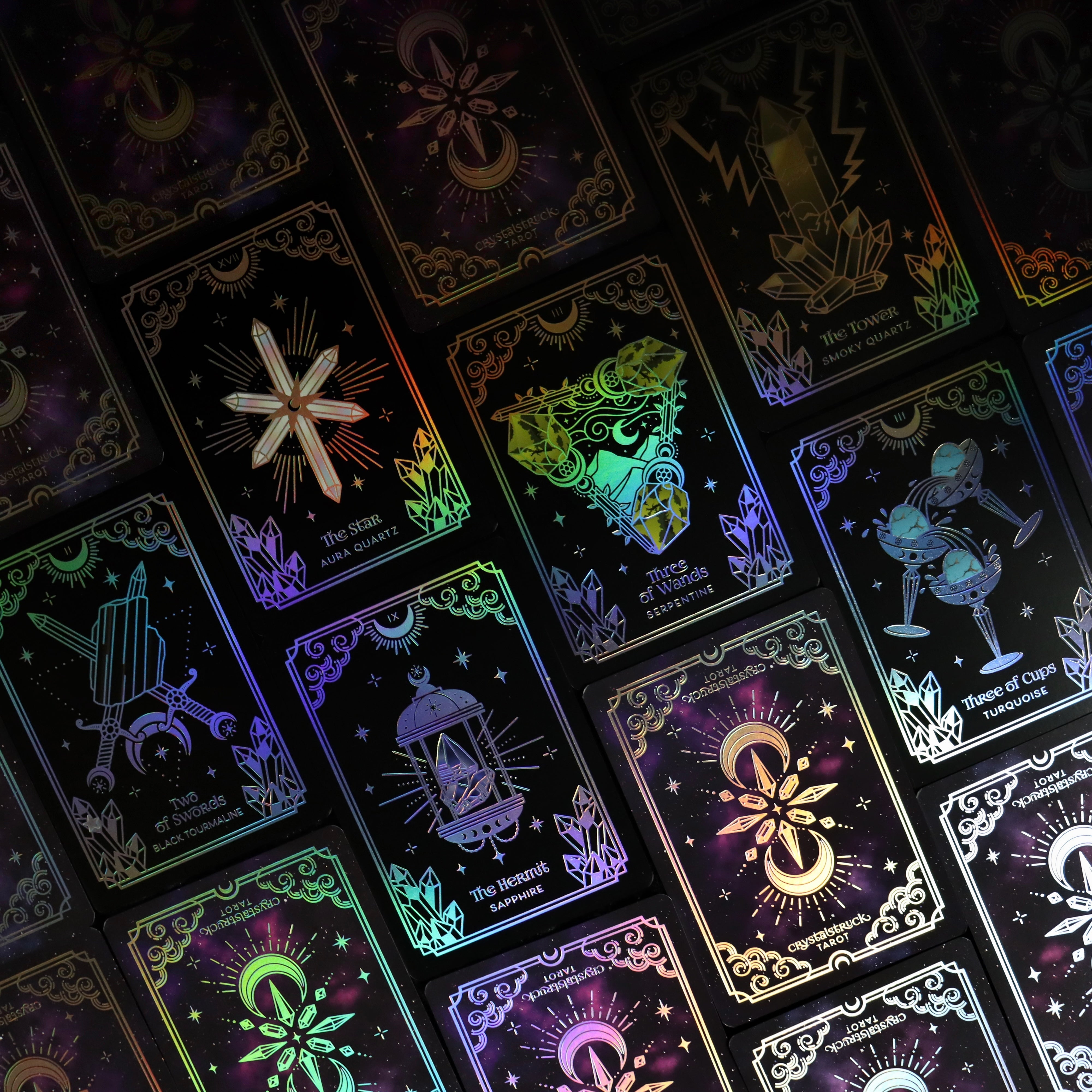 Silver Crystalstruck Tarot© Card Deck by Moonstruck Crystals, limited edition, featuring intricately designed tarot cards with silver accents.