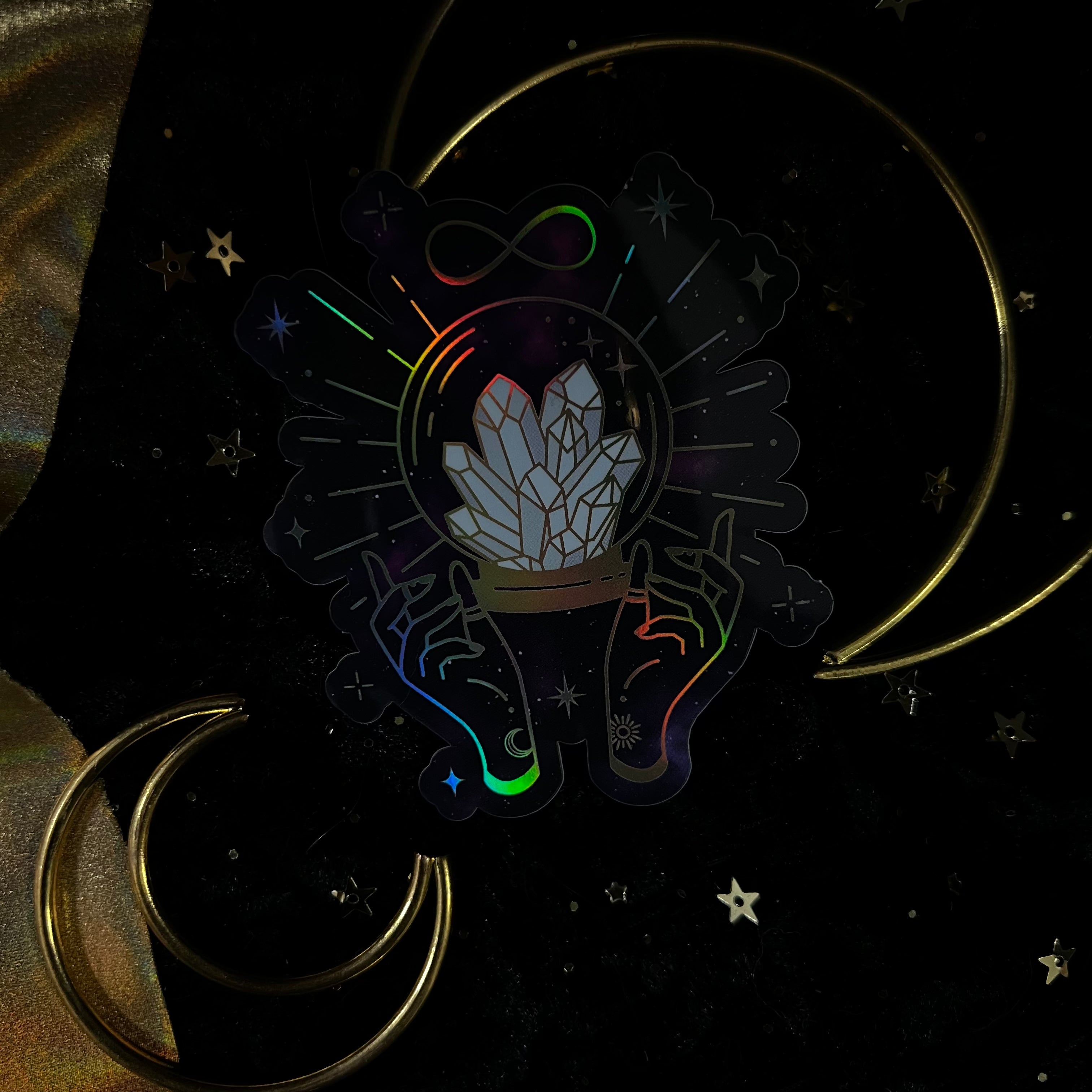 Colorful Crystalstruck Tarot© Holo Stickers featuring vibrant, holographic designs inspired by tarot cards, from Moonstruck Crystals.