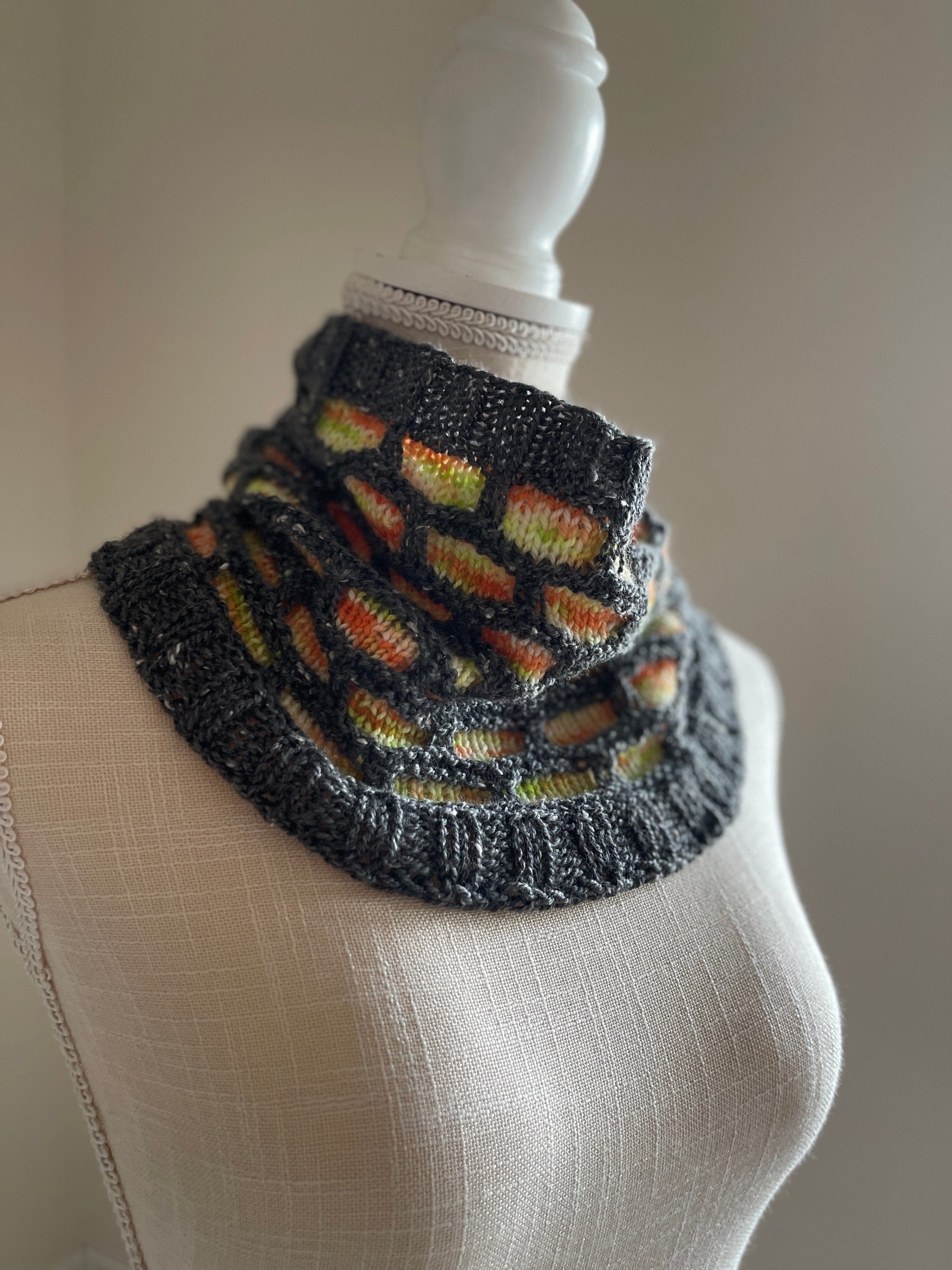 Digital pattern for the Haunted Honeycombs Cowl by Mountaintop Yarn, showcasing a cozy, textured knit design in a detailed close-up.