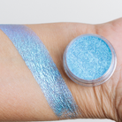 Bright pink Candy Pigment from NABA Cosmetics USA in a small jar with loose, shimmering pigment powder.